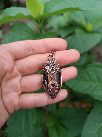 Acorn fairy house pendant.