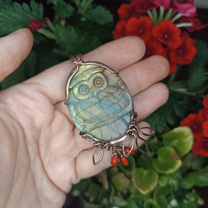 Owl sitting on a dogwood branch. Pendant.