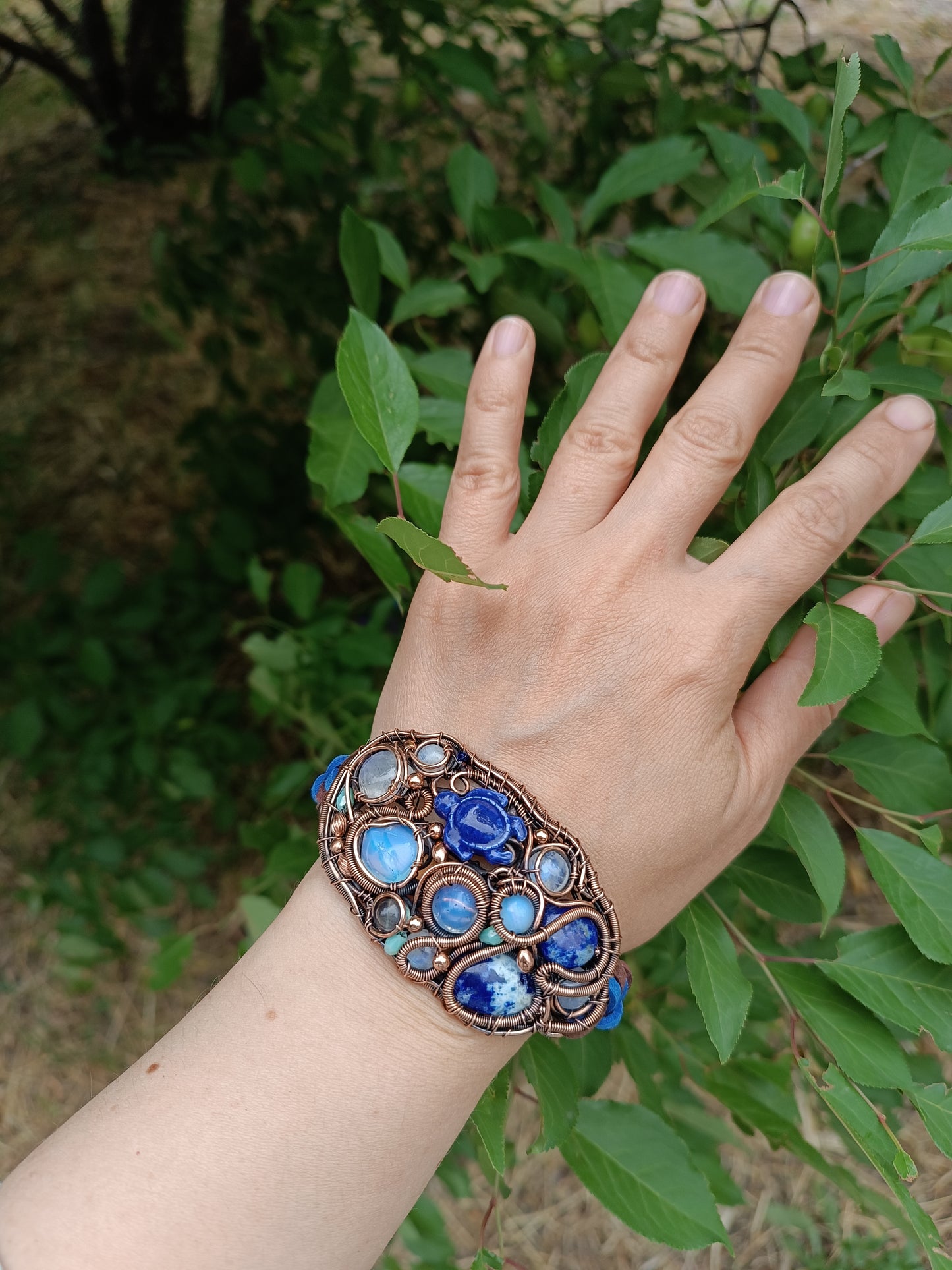 Wire wrapped bracelet with sea turtle