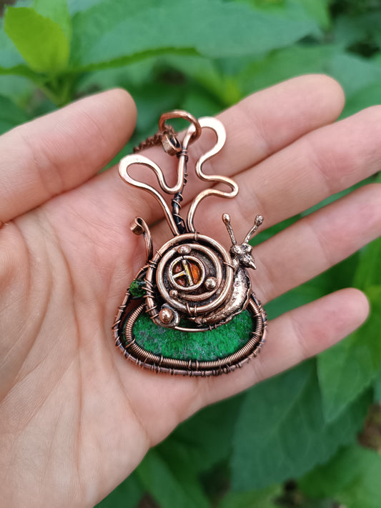 Snail house fairy house necklace with uvarovite.