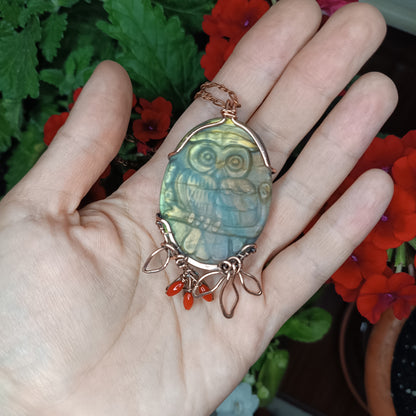 Owl sitting on a dogwood branch. Pendant.