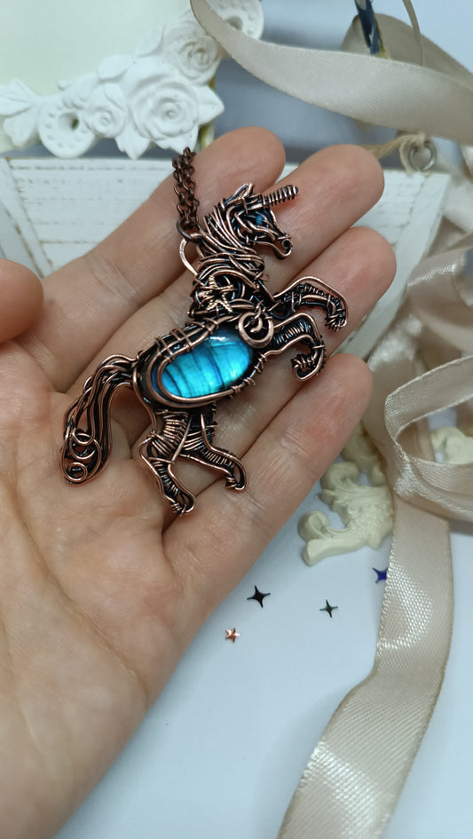 Unicorn and the falling star. Copper pendant with labradorites.