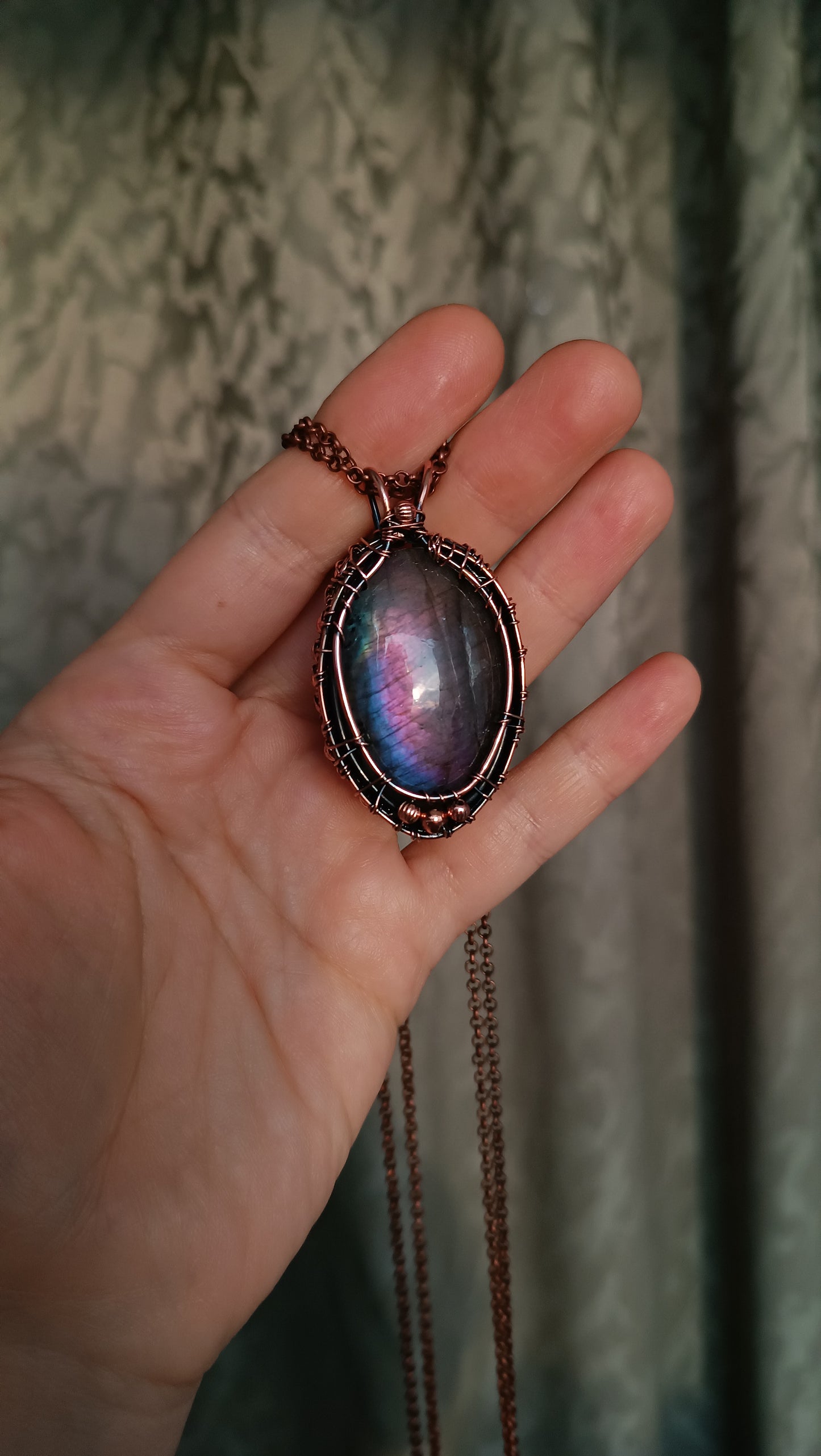For Cheryl. Rhodonite bear and purple labradorite pendant.