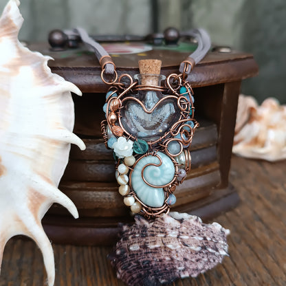 Heart of the ocean. Reversible vial necklace