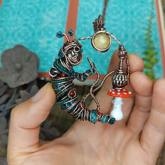Blue caterpillar necklace