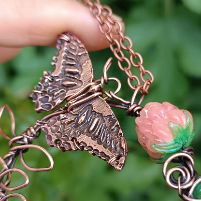 Life circle. Pink raspberry butterfly necklace