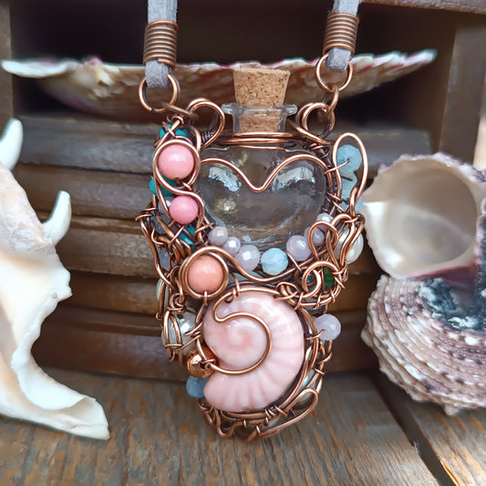 Heart of the ocean. Reversible vial necklace