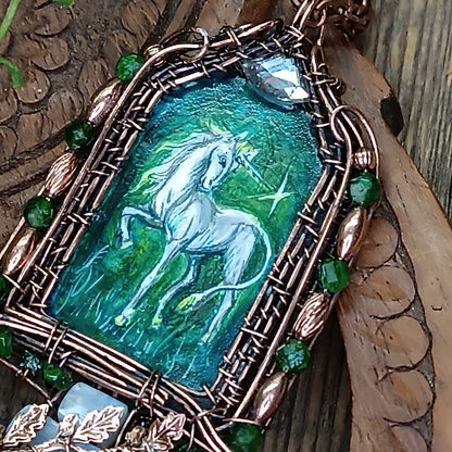 The ballad of white unicorn and princess. Wire wrapped necklace with miniature paintings.
