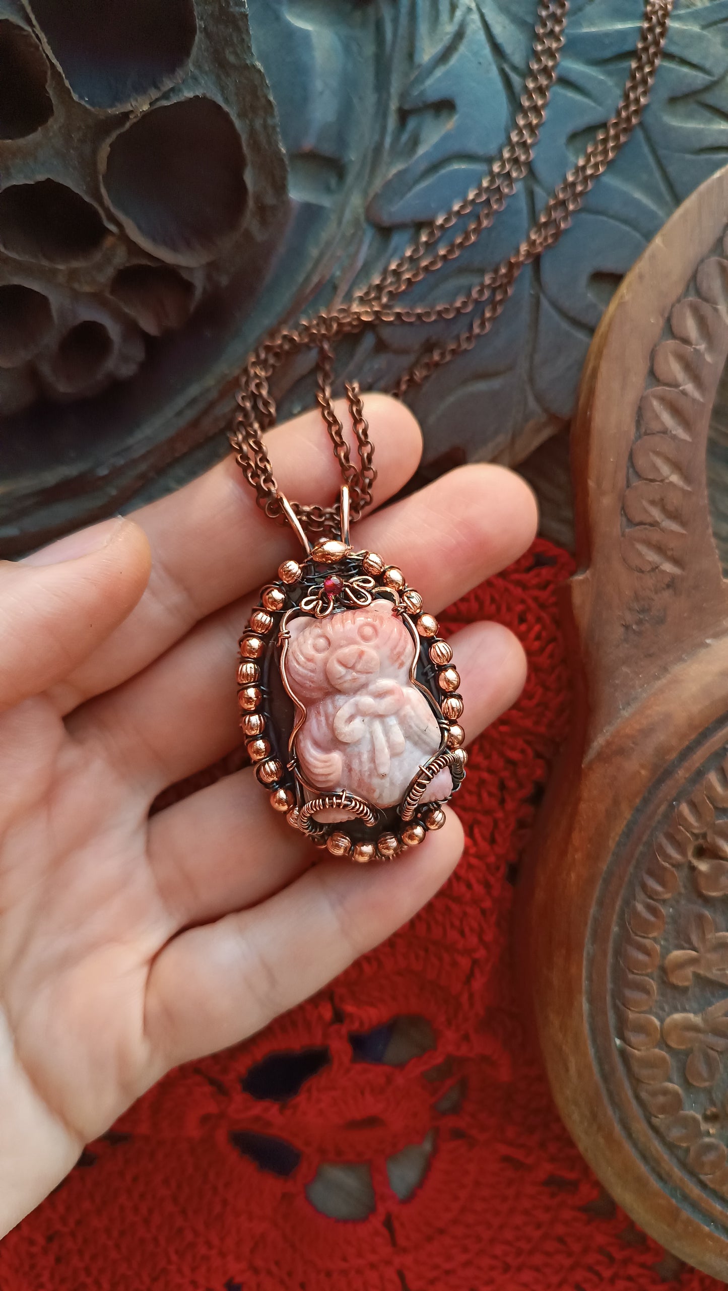 For Cheryl. Rhodonite bear and purple labradorite pendant.