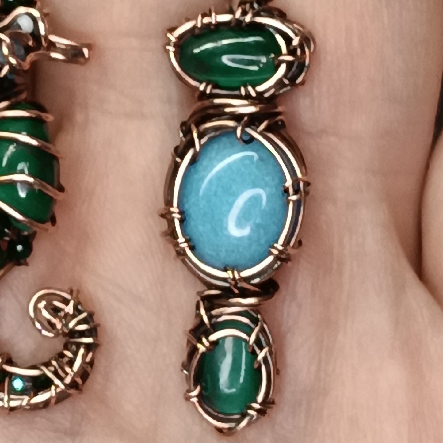 "Ocean" dangling earrings.