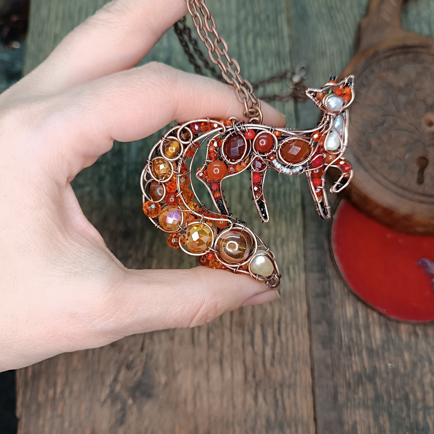 Swoopy tail Foxy. Sparkly wire wrapped pendant.