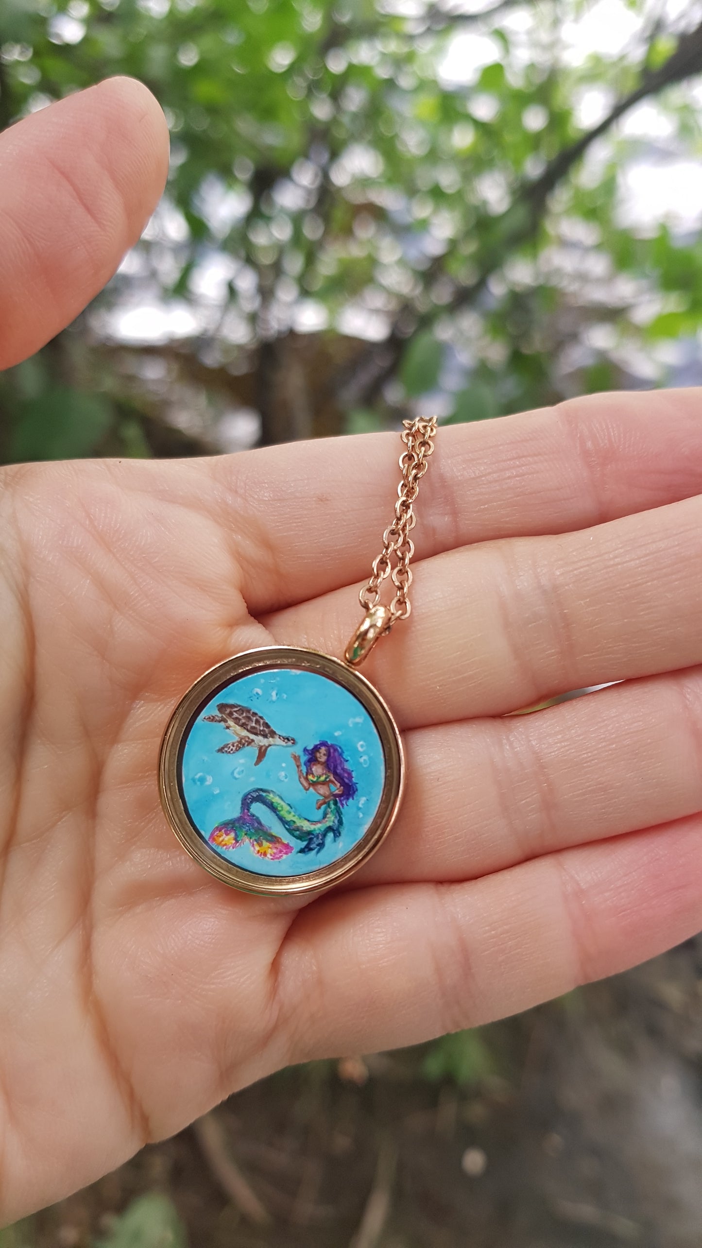 Mini reversible Mermaid and sea turtles pendant.