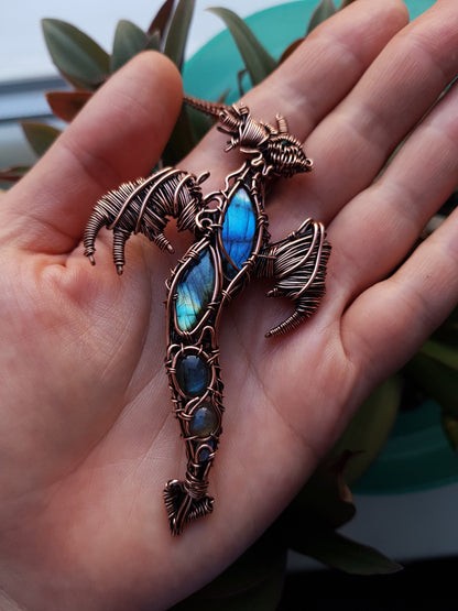 Dancing in the sky. Blue dragon with open wings. Copper pendant.