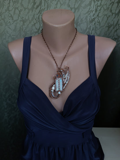 The ballad of the Pearl Dragon and the Moonstone Castle. Wire wrapped necklace