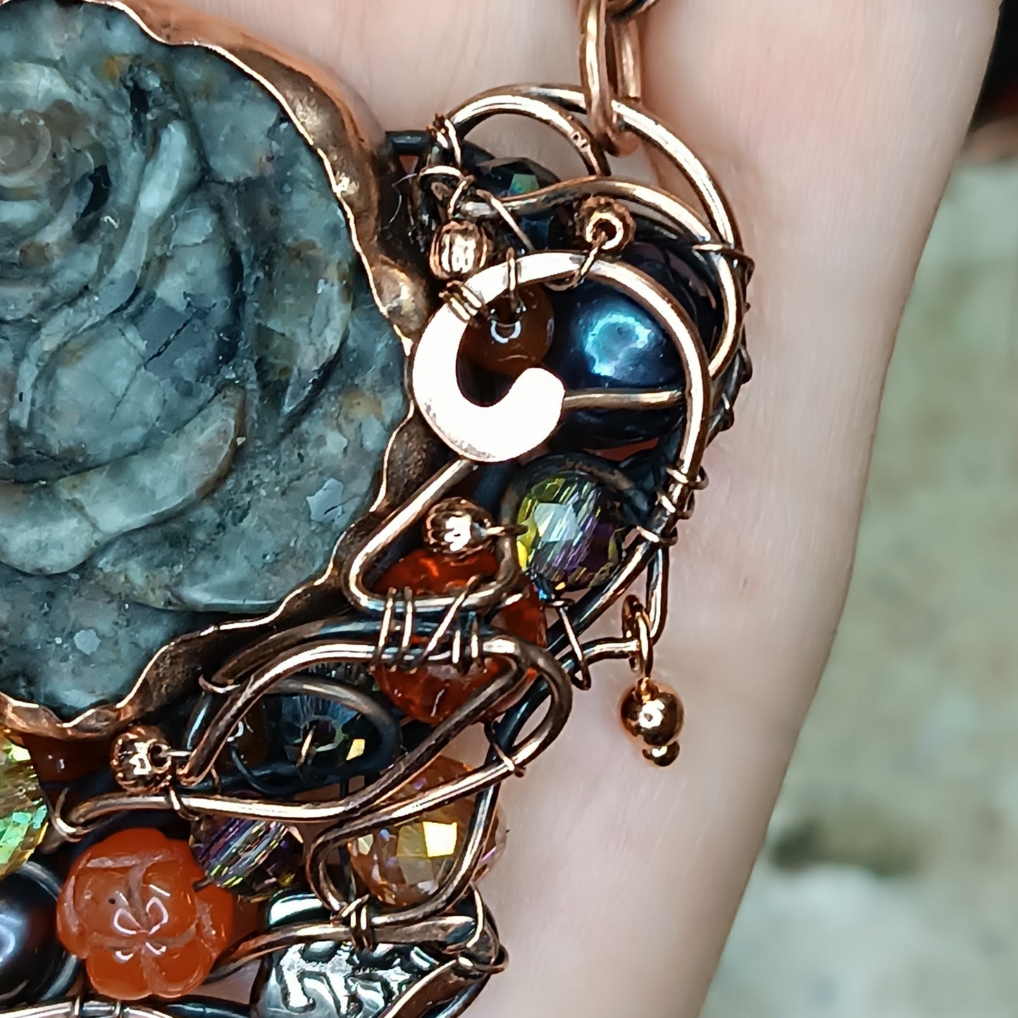 Hidden fire. Rose necklace.