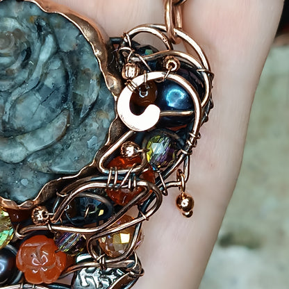 Hidden fire. Rose necklace.