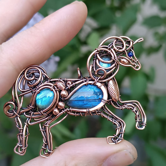 Blue wind. Unicorn pendant.