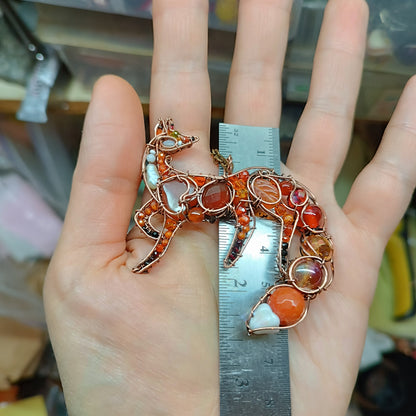 Foxy the swoopy tail! Copper necklace with carnelians.
