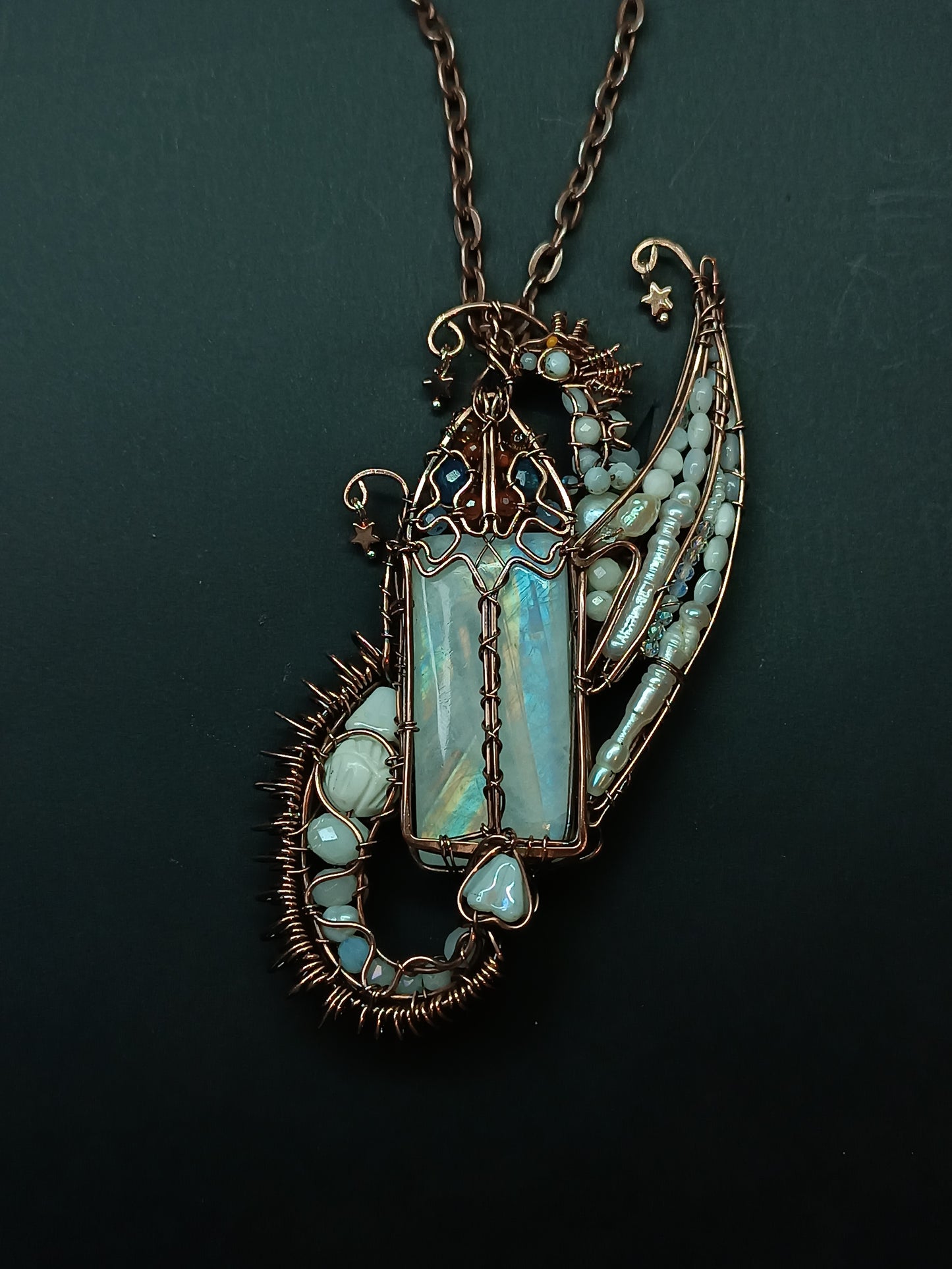 The ballad of the Pearl Dragon and the Moonstone Castle. Wire wrapped necklace