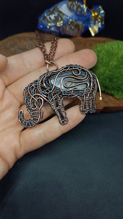 Blue elephant pendant.