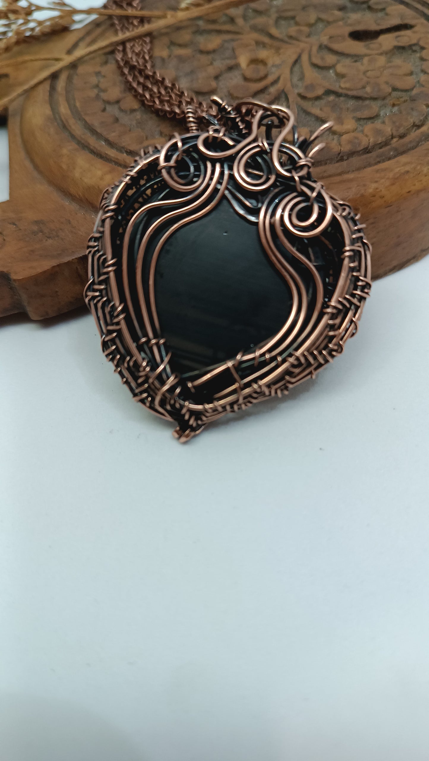 Black obsidian dragon pendant.