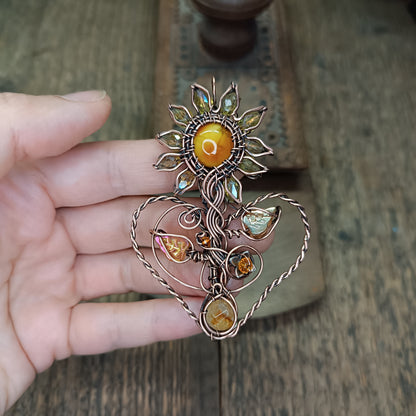 Sunflower pendant with citrine root.