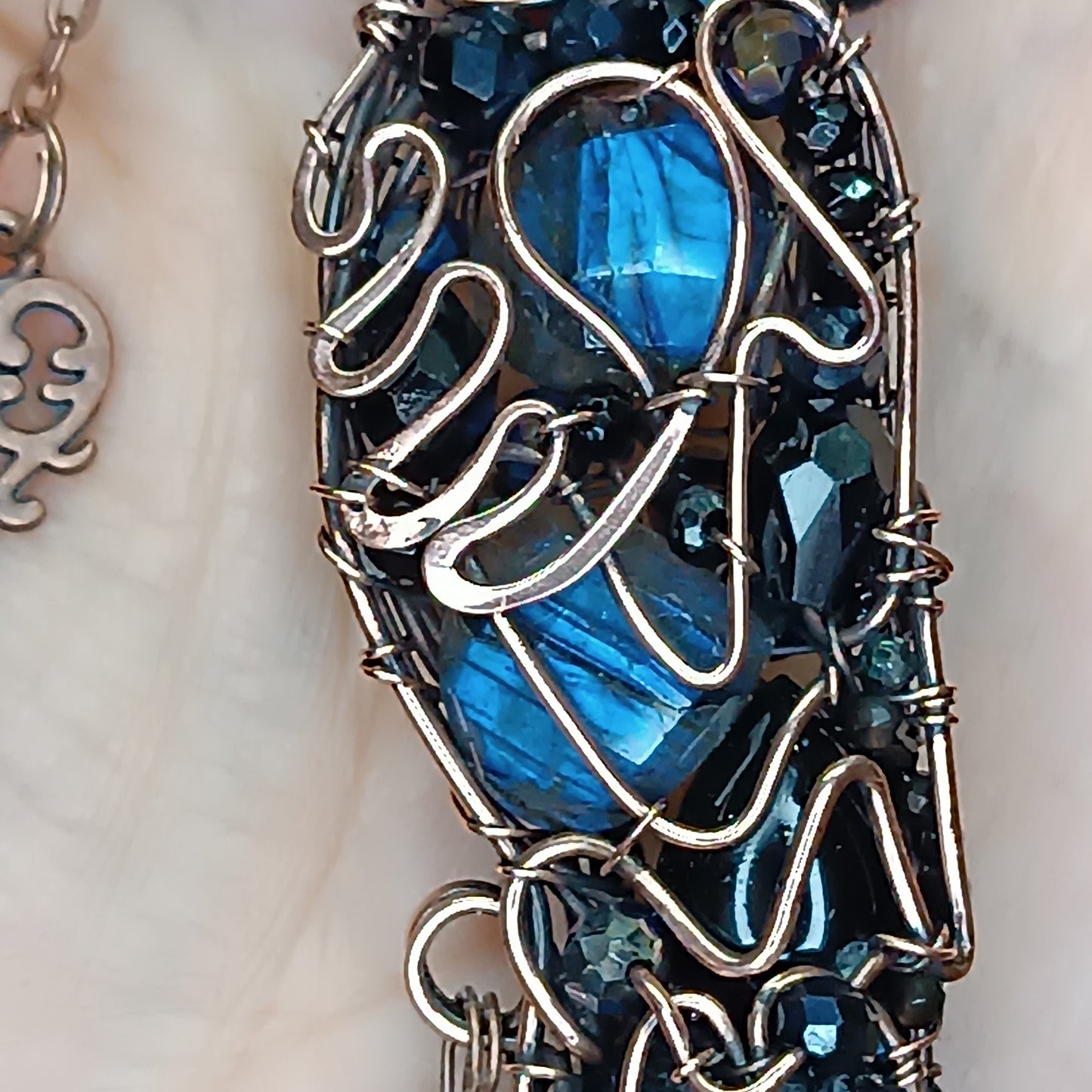 Secret keeper. Raven with the blue star. Wire wrapped necklace
