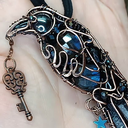 Secret keeper. Raven with the blue star. Wire wrapped necklace