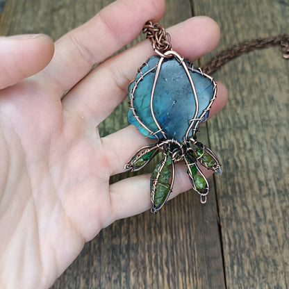 Blue rose with hidden rainbows. Necklace.