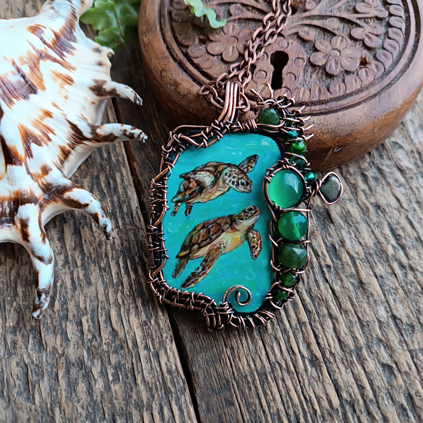 Aquatic adventure 🐢🦦 Hand painted wire wrapped necklace. 2 sided.