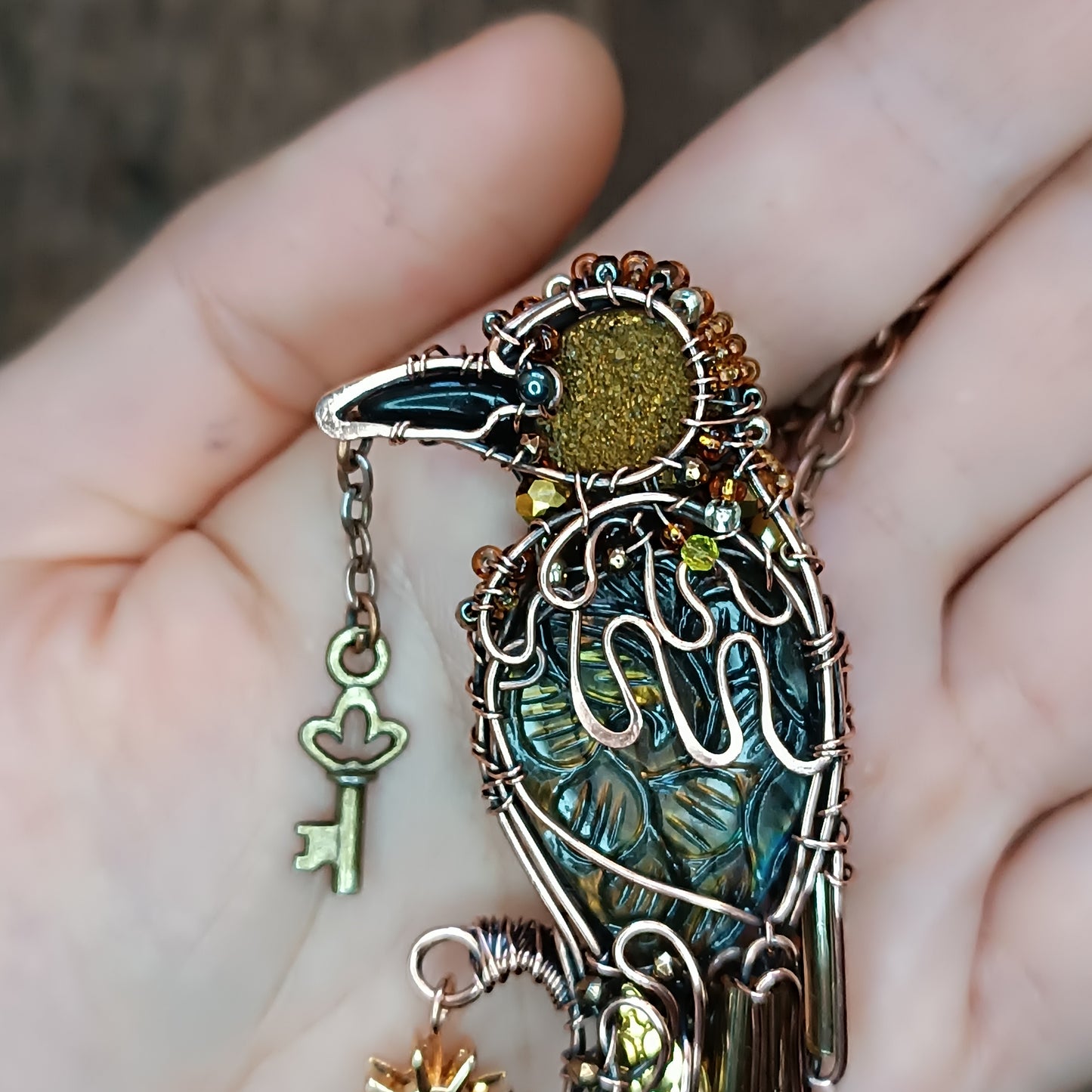Secret keeper and The Sun. Raven necklace.