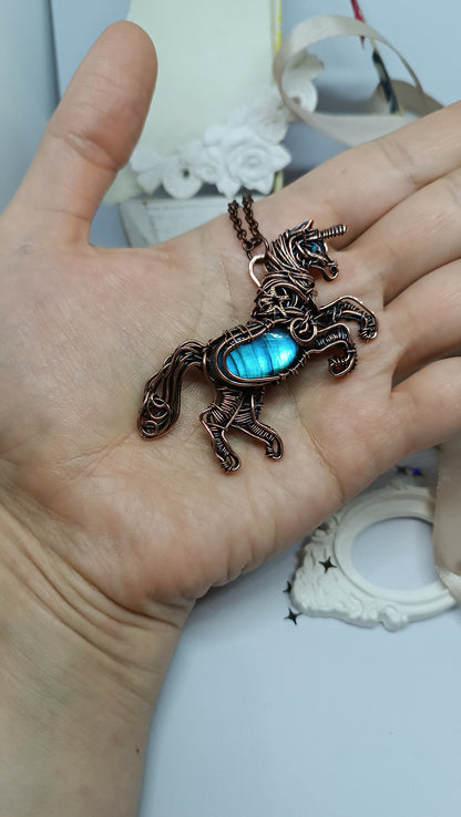 Unicorn and the falling star. Copper pendant with labradorites.