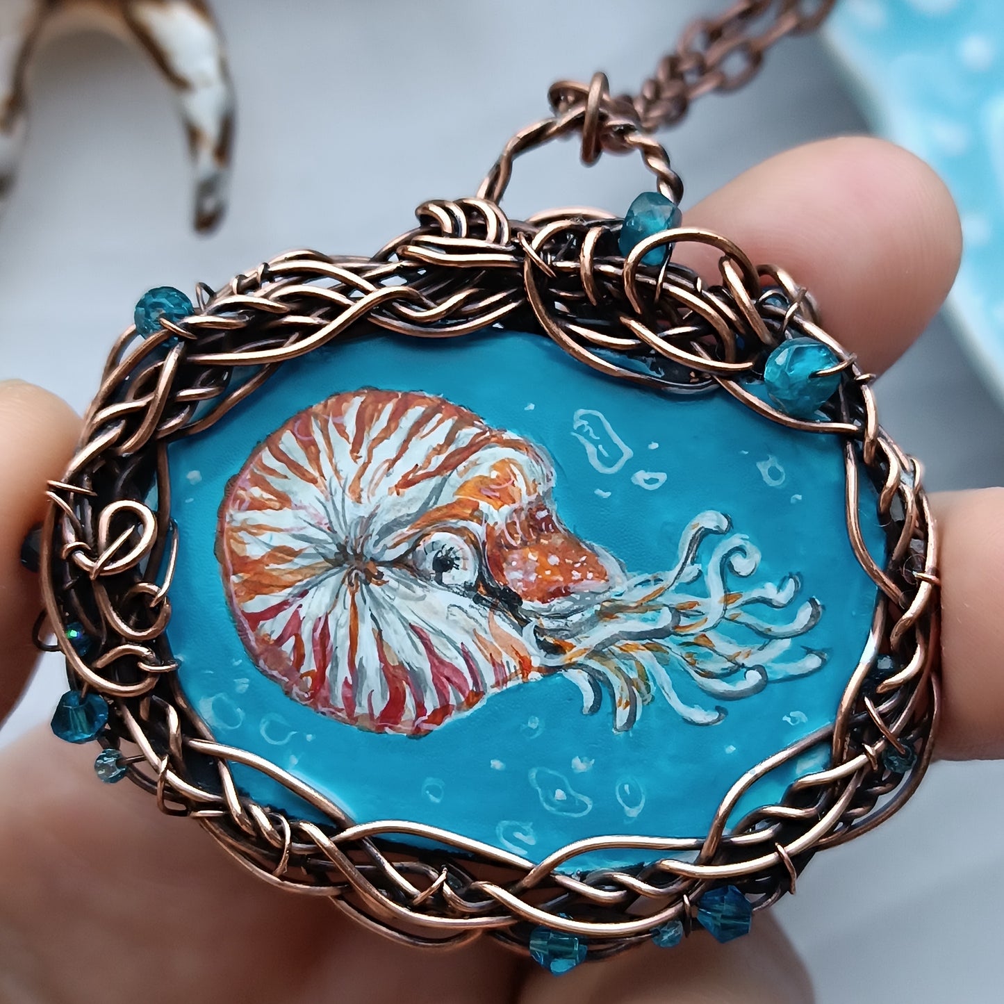 "Unforgettable diving". Wire wrapped and hand painted necklace.
