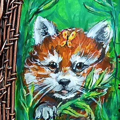 Red panda and a butterfly necklace. Reversible.