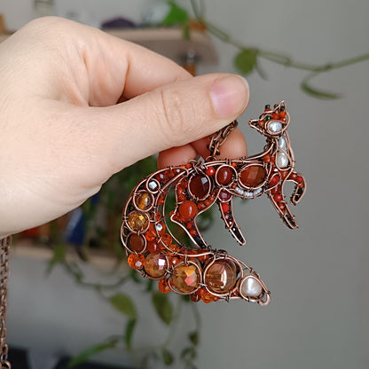 Swoopy tail Foxy. Sparkly wire wrapped pendant.