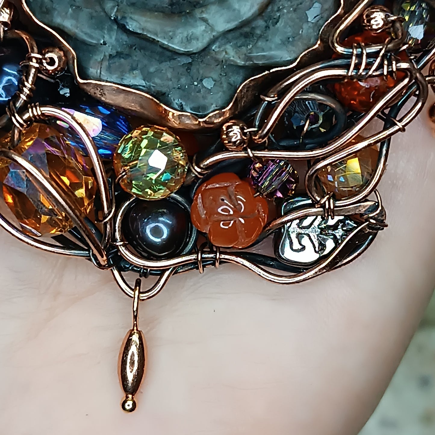 Hidden fire. Rose necklace.